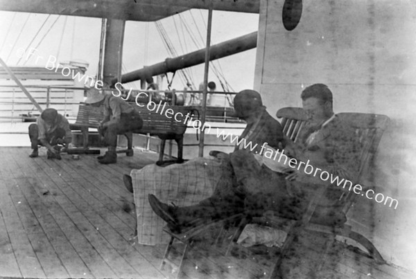 ON BOARD: PASSENGERS IN DECK-CHAIRS